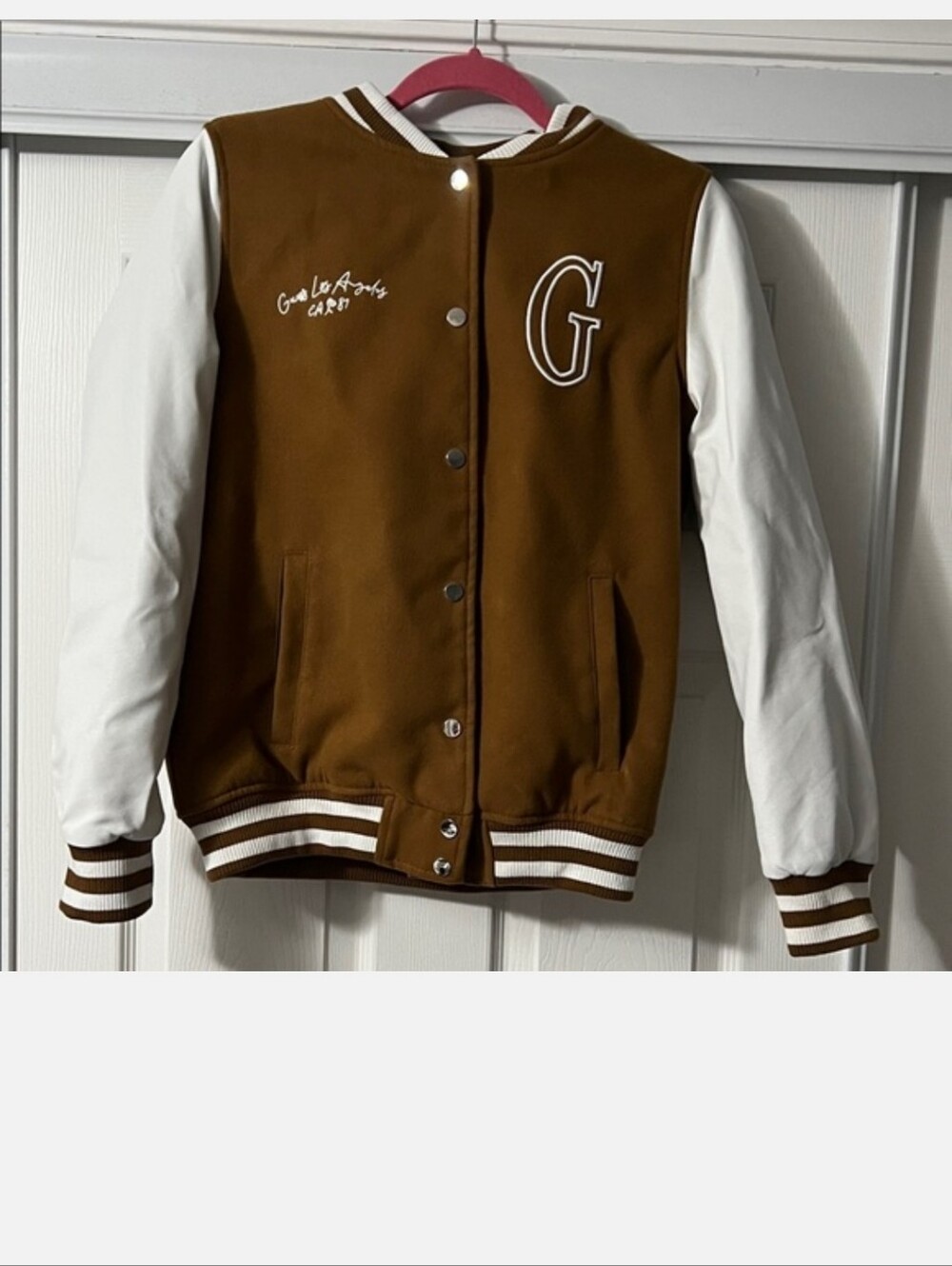 Guess Brown and White Varsity Jacket. New without tags. Never worn.